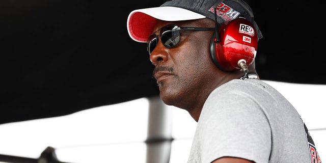 NBA Hall of Famer Michael Jordan and co-owner of 23XI Racing watches from the 23XI Racing pit box during the NASCAR Go Bowling Cup Series at The Glen at Watkins Glen International on August 8, 2021 , in Watkins Glen, New York.