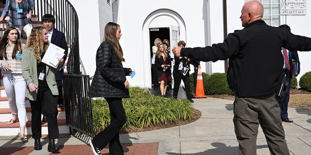 The Colleton County Courthouse is evacuated in response to a bomb threat during Alex Murdaugh’s double murder trial in Walterboro, S.C., Feb. 8, 2023.