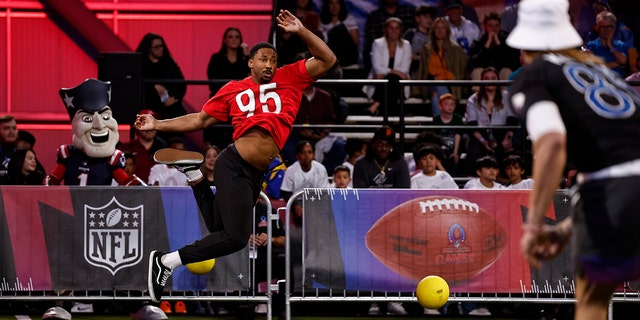 AFC defensive end Myles Garrett #95 of the Cleveland Browns dodges a ball thrown by NFC tight end George Kittle #85 of the San Francisco 49ers competes in the Epic Pro Bowl Dodgeball event during the Pro Bowl Games skills events on February 02, 2023 in Las Vegas, Nevada.