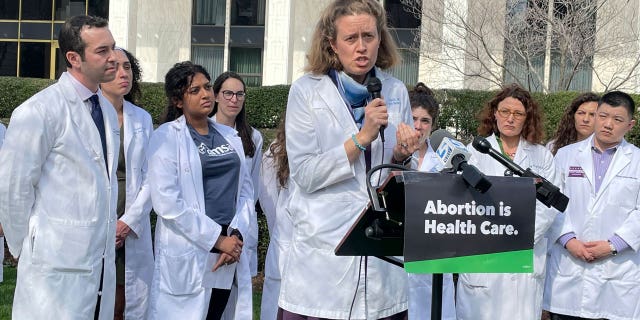 Dr. Alison Stuebe, a North Carolina maternal-fetal medicine doctor, urges state lawmakers to oppose any new abortion restrictions at a news conference outside the Legislative Building in Raleigh, N.C., on Feb. 22, 2023.