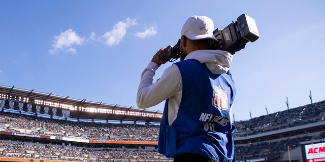 An NFL Films cameraman films a game between the Chicago Bears and the Philadelphia Eagles at Lincoln Financial Field on November 3, 2019 in Philadelphia.