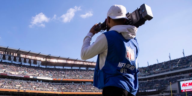 An NFL Films cameraman films a game between the Chicago Bears and the Philadelphia Eagles at Lincoln Financial Field on November 3, 2019 in Philadelphia.