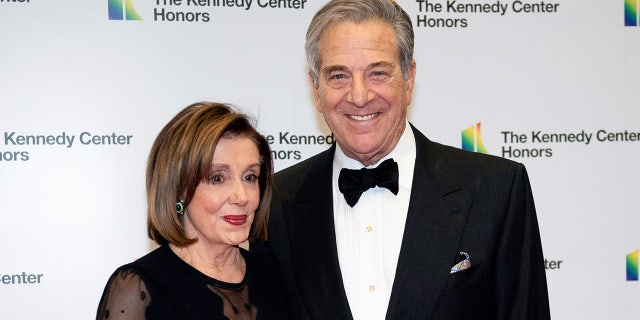 Then-Speaker of the House Nancy Pelosi, D-Calif., and her husband, Paul Pelosi, arrive at the State Department for the Kennedy Center Honors State Department Dinner on Dec. 7, 2019, in Washington. 