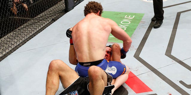 Nate Marquardt punches James Te Huna during UFC Fight Night at Vector Arena on June 28, 2014, in Auckland, New Zealand.