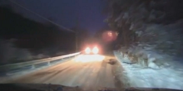 Snow is seen falling on roads north of New York City on Tuesday, Feb. 28.