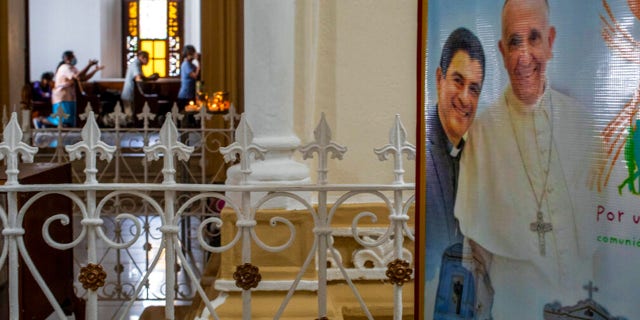 A poster featuring Bishop Rolando Alvarez and Pope Francis hangs inside the Cathedral in Matagalpa, Nicaragua, Aug. 19, 2022.