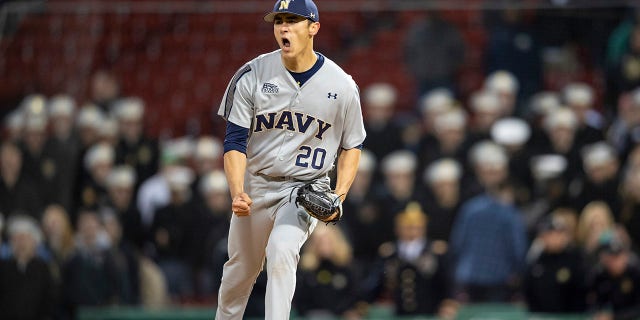 Noah Song of the Naval Academy reacts after recording the final out of a game against Army West Point April 20, 2018, at Fenway Park in Boston.