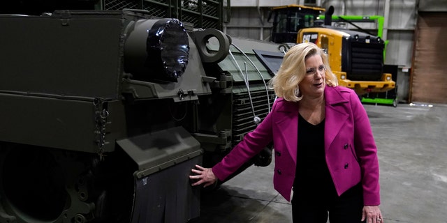Secretary of the Army Christine Wormuth looks at a M1A2 Abrams main battle tank as she tours the Joint Systems Manufacturing Center on Feb. 16, 2023, in Lima, Ohio. 