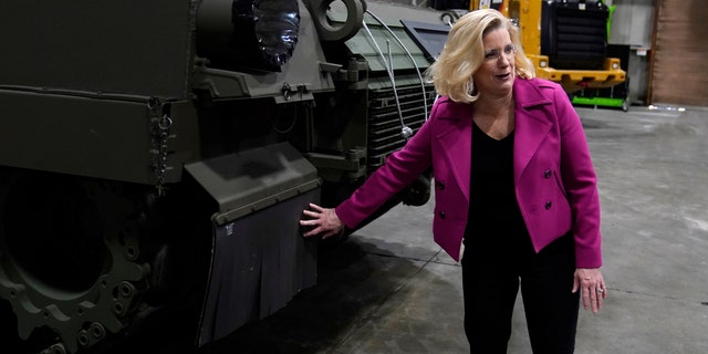 Secretary of the Army Christine Wormuth looks at a M1A2 Abrams main battle tank as she tours the Joint Systems Manufacturing Center on Feb. 16, 2023, in Lima, Ohio.