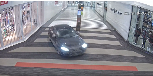A 2011 black Audi is seen racing through the inside of the Vaughan Mills mall in Ontario, Canada, on Feb. 1, 2023.