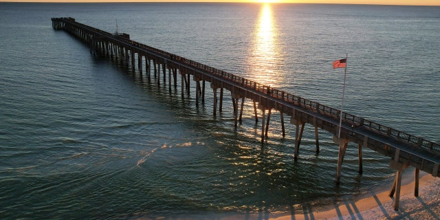 PANAMA CITY BEACH, FLORIDA - NOVEMBER 06: Athletes compete during the 2021 IRONMAN Florida on November 6, 2021, in Panama City Beach, Florida.
