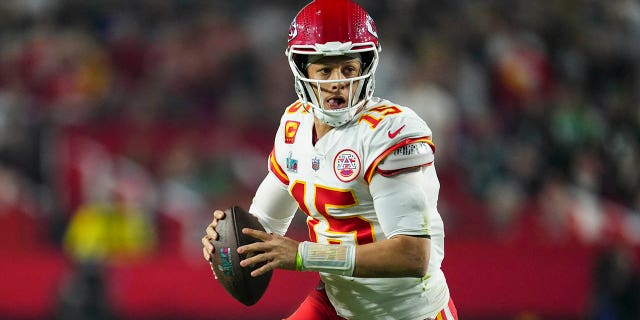 Patrick Mahomes #15 of the Kansas City Chiefs runs the ball against the Philadelphia Eagles during the third quarter in Super Bowl LVII at State Farm Stadium on February 12, 2023 in Glendale, Arizona.