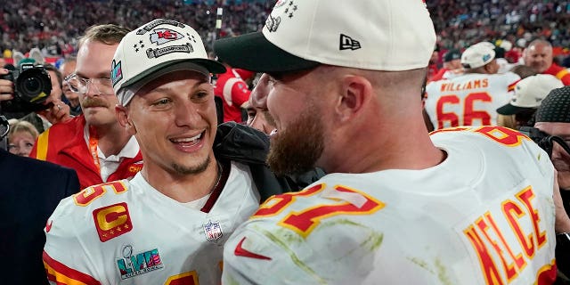 Kansas City Chiefs quarterback Patrick Mahomes, left, and tight end Travis Kelce celebrate victory over the Philadelphia Eagles after the NFL Super Bowl LVII football game, Sunday, Feb. 12, 2023, in Glendale, Arizona.