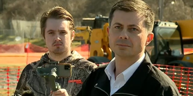 Transportation Secretary Pete Buttigieg, right, admits during a property convention that he waited excessively agelong to make a nationalist connection connected nan Norfolk Southern train derailment successful East Palestine, Ohio connected Thursday, Feb. 23, 2023.