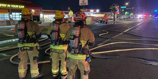 Hazmat crews with the Phoenix and Glendale fire departments worked to contain and divert the leak.