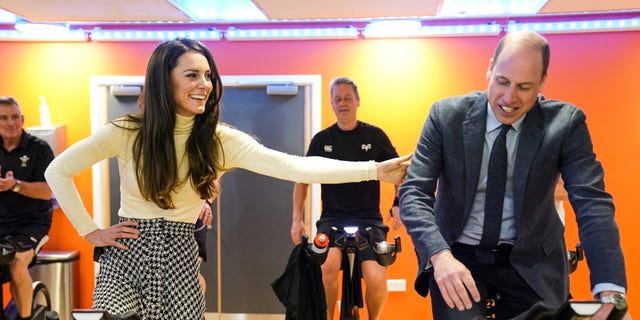 Kate Middleton and Prince William take part in a spin class at the Aberavon Leisure and Fitness Centre in Port Talbot.