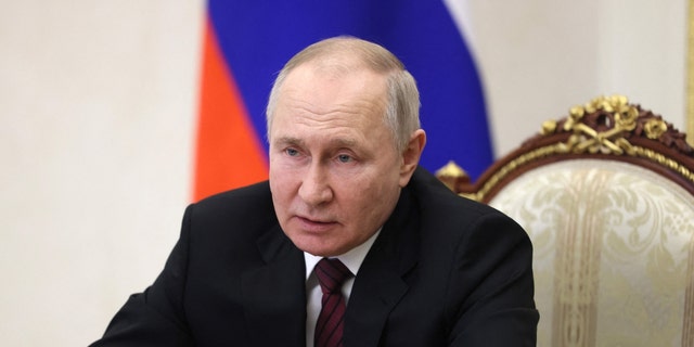 Russian President Vladimir Putin chairs a meeting of the Presidential Council for Science and Education via a video link at the Kremlin in Moscow on February 8, 2023. 