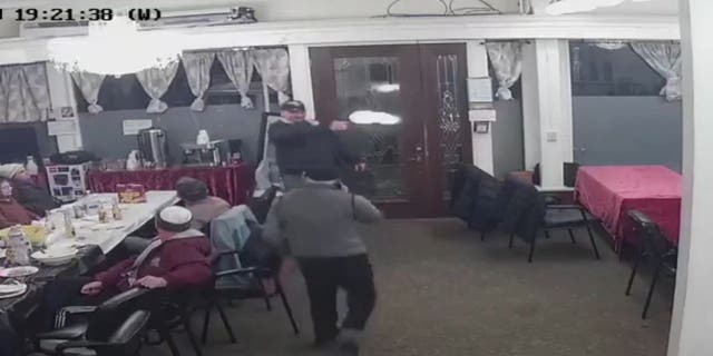 A 51-year-old man, Dmitri Mishin, fired blanks into a Jewish Community Center meeting.