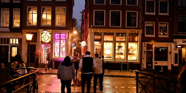 General view of Red Light District on December 10, 2022 in Amsterdam, Netherlands.De Wallen, Amsterdams red-light district, is internationally known and one of the main tourist attractions of the city. It offers legal prostitution and a number of coffee shops that sell marijuana. (Photo by Stefano Guidi/Getty Images)