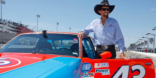 NASCAR Hall of Famer Richard Petty prepares to drive a replica of his #43 Pontiac STP at WWT Raceway on June 3, 2022 in Madison, Illinois.
