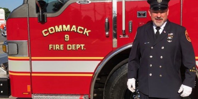 By hiking the Appalachian Trail, Weisberg, shown in front of a Commack Fire Dept. truck, hopes to bring more awareness to PTSD, as well as to first responder and veteran suicide.