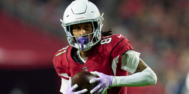 Robbie Anderson of the Arizona Cardinals runs against the New England Patriots at State Farm Stadium on December 12, 2022 in Glendale, Arizona.