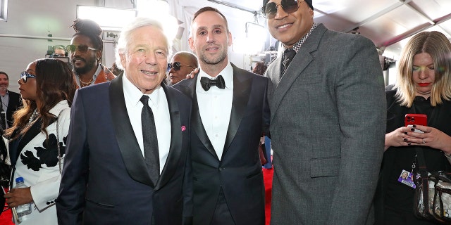 Robert Kraft, left, Michael Rubin and LL Cool J attend the 65th Grammy Awards on February 5, 2023 in Los Angeles.