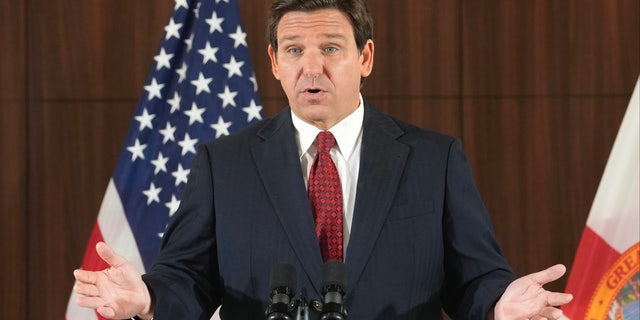 Governor Ron DeSantis gestures during a news conference where he spoke of new law enforcement legislation that will be introduced during the upcoming session, Thursday, Jan. 26, 2023, in Miami. (AP Photo/Marta Lavandier)