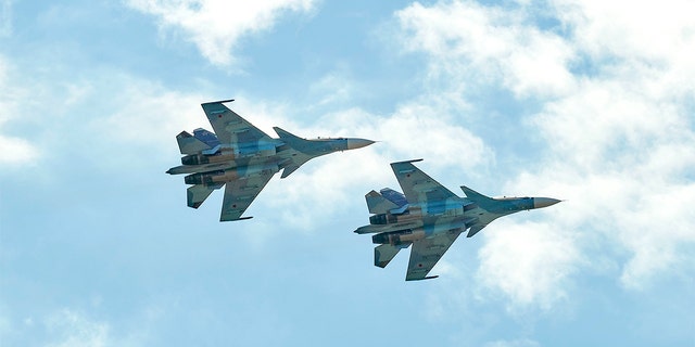 SU-30 naval aviation in close formation in the sky over Zhukovsky, Russia, July 24, 2021.