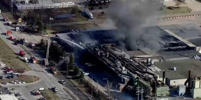 Crews work to extinguish a fire at an Ohio metal plant. 