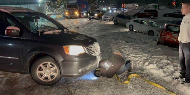 Jon Gilbert helped rescue much than 20 cars stuck successful nan snowfall successful Portland, Oregon.