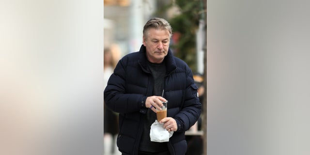 Alec Baldwin was spotted getting his morning coffee in Brooklyn on Wednesday. The actor's outing comes after it was reported that Dave Halls, the assistant director of his movie "Rust," may testify against him in the 2021 shooting death of cinematographer Halyna Hutchins. Baldwin and armorer Hannah Gutierrez-Reed are facing charges of involuntary manslaughter. Baldwin is also being sued by the family of Hutchins.