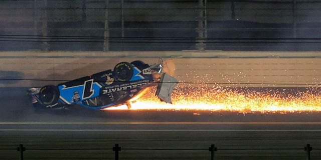 Sam Mayer flips and slides with flames during the NASCAR Xfinity Series Beef.  It's what's for dinner.  300 at Daytona International Speedway on February 18, 2023. 