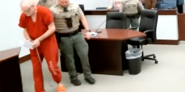 Kelly appeared in court in an orange jail jumpsuit on Feb. 2. 