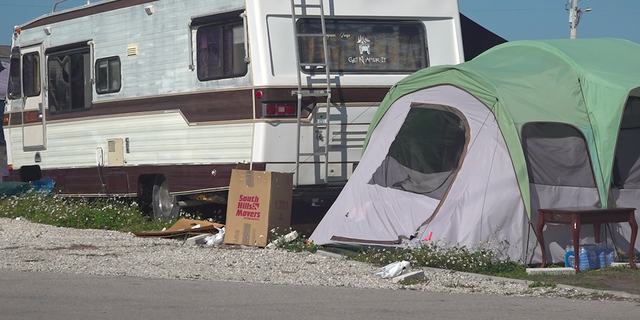 Four months after Hurricane Ian, some homeowners are still living in tents on Pine Island.