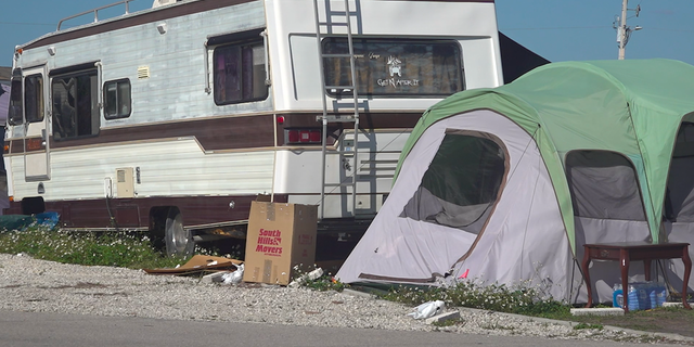 Four months after Hurricane Ian, some homeowners are still living in tents on Pine Island. 