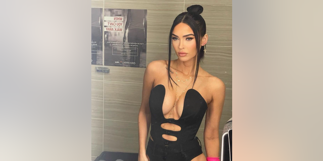 Megan Fox shared what could be a revenge post as she flaunted her fit physique in a daring mirror selfie.