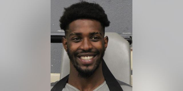 Tamorian Moore, 23, was arrested on Saturday for allegedly murdering his elderly neighbor. 