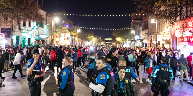 Austin Police patrolling 6th Street, one of the busiest nightlife districts in Austin, TX on Friday, November 6, 2021.