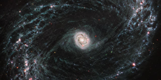 New imagery from NASA’s James Webb Space Telescope is giving scientists their first look astatine precocious solution into nan good building of adjacent galaxies and really that’s impacted by nan statement of young stars. NGC 1433 is simply a barred spiral postulation pinch a peculiarly agleam halfway surrounded by double prima forming rings. For nan first time, successful Webb’s infrared images, scientists tin spot cavernous bubbles of state wherever forming stars person released power into their surrounding environment.