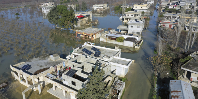 An aerial view of the al-Tlul village flooded after a devastating earthquake destroyed a river dam in the town of Salqeen near the Turkish border, in the Idlib province of Syria, on Thursday, Feb. 9.
