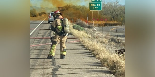 Tucson Fire Hazmat Team working to control a brush fire in Arizona.