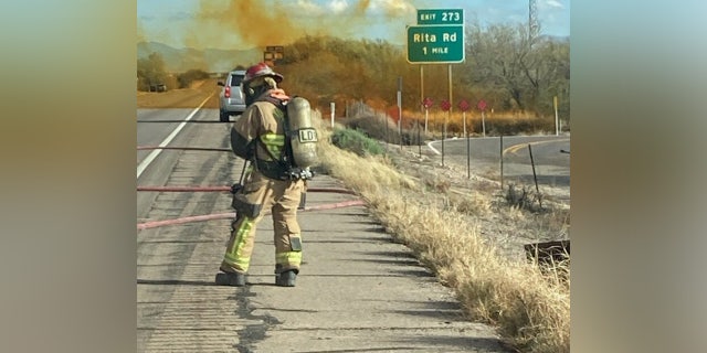 Tucson Fire Hazmat Team working to control a brush fire in Arizona.