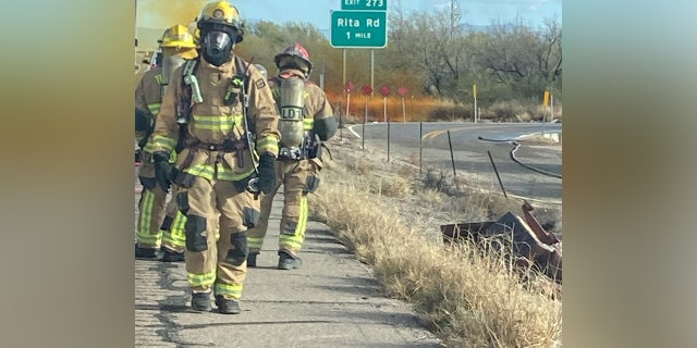 Tucson Fire Hazmat Team working to control a brush fire in Arizona.