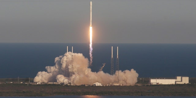 A SpaceX Falcon 9 rocket carrying a TESS spacecraft lifts off on Wednesday, April 18, 2018, from Space Launch Complex 40 at Cape Canaveral Air Force Station in Florida. TESS, which stands for Transiting Exoplanet Survey Satellite, is a telescope/camera that's mission is hunting for undiscovered worlds around nearby stars, NASA says.