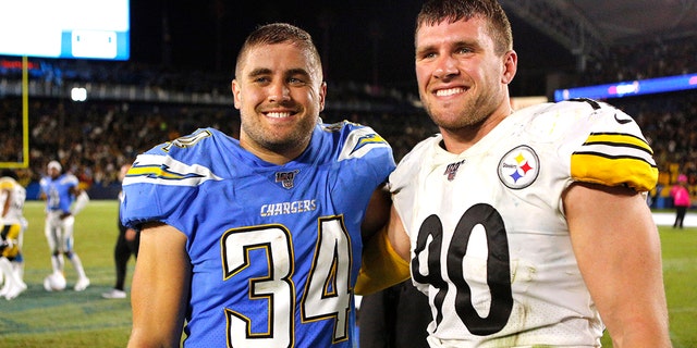 Brothers Derek Watt of the Los Angeles Chargers and TJ Watt of the Pittsburgh Steelers pose after a game at Dignity Health Sports Park on October 13, 2019 in Carson, California.