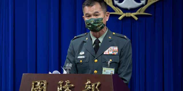 In this photo released by the Taiwan Ministry of National Defense, Major general Huang Wen-chi, the assistant deputy chief of general staff for intelligence speaks during a press conference in Taipei, Taiwan, Tuesday, Feb. 14, 2023. Amid speculation over alleged Chinese spy balloons, Taiwan's Defense Ministry said Tuesday it would shoot down any suspected military object coming close to its shores from mainland China.