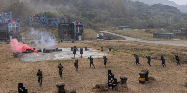 The U.S. is sending more troops to Taiwan to help train its military, a U.S. official told Fox News on Thursday, as tensions remain high in a territorial dispute with China. Taiwan's army is shown here conducting drills on Jan. 12 in Kaohsiung, Taiwan.