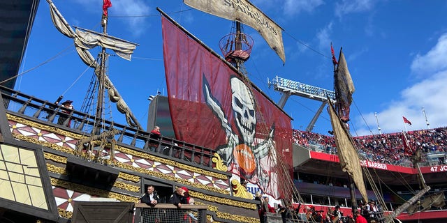 Raymond James Stadium, home of the NFL's Tampa Bay Buccaneers, boasts a pirate ship in the north end zone as its signature attraction. The deck is filled with crew members in pirate garb who fire the ship's cannons when the hometown team scores.