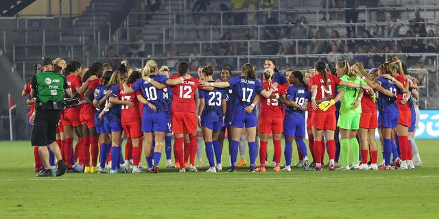 Players from the United States and Canada huddle before the game between Canada and the United States at Exploria Stadium on February 16, 2023 in Orlando, Florida.